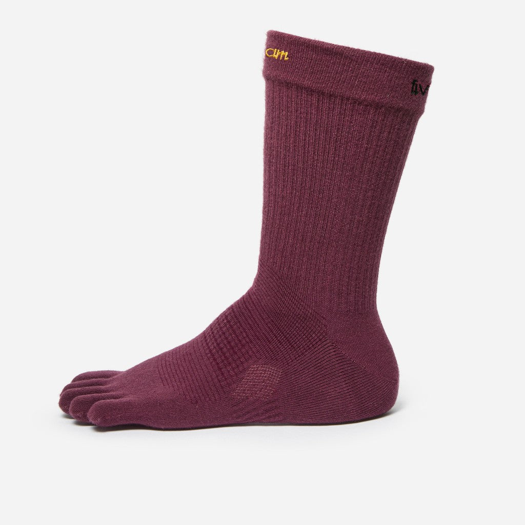 Side profile of a maroon toe sock