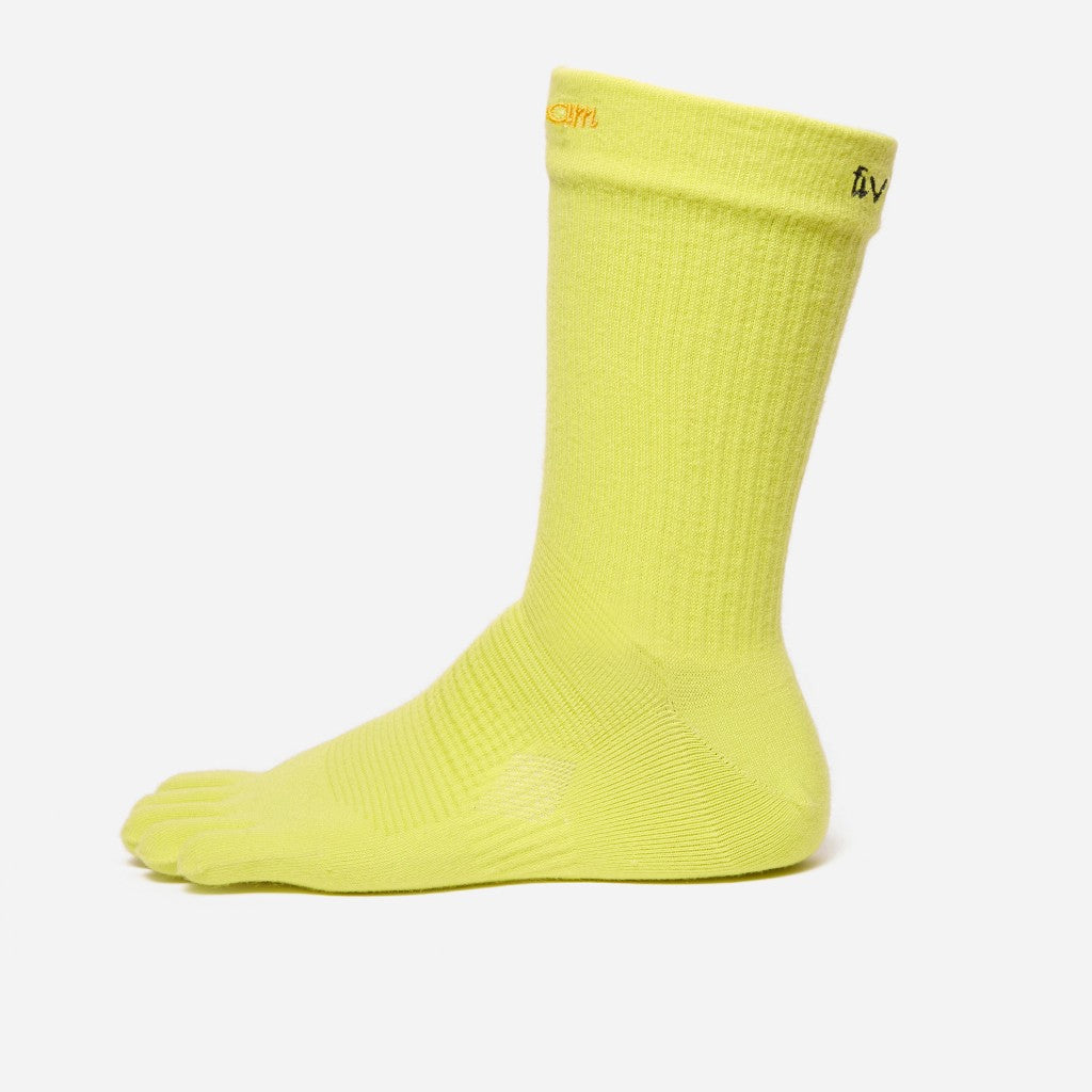 Side profile of a yellow toe sock